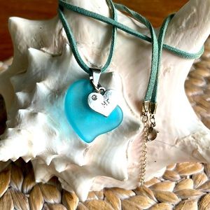 Hand made from sea glass two hearts pendant
